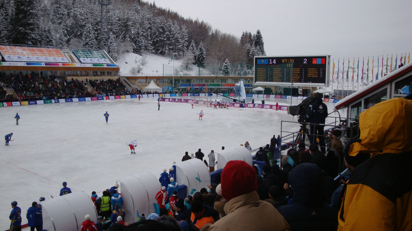 Medeu rink in Almaty during the 2011 Asian Winter Games. The game being played is called Bandy, which has rules similar to soccer but played on a large ice surface with skates, sticks and a round ball (Wikimedia Commons). 