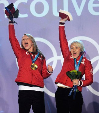  Heather Moyse and Kaillie Humphries celebrate their gold-medal performance at Vancouver 2010. - Photo Canadian Press