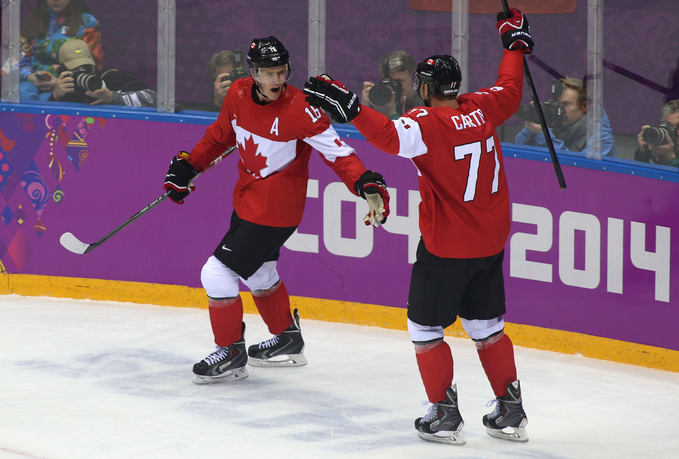 Russia's Alexander Ovechkin shakes hands with Canada's Sidney