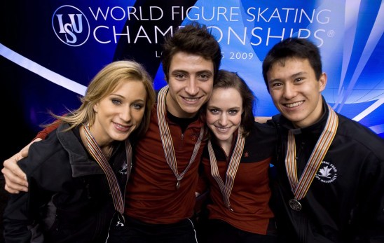 Ladies silver medalist Joannie Rochette, ice dance bronze medalists Scott Moir and Tessa Virtue, and men's silver medalist Patrick Chan, left to right, pose with their medals at the World Figure Skating Championships, Sunday, March 29, 2009 in Los Angeles. THE CANADIAN PRESS/Paul Chiasson