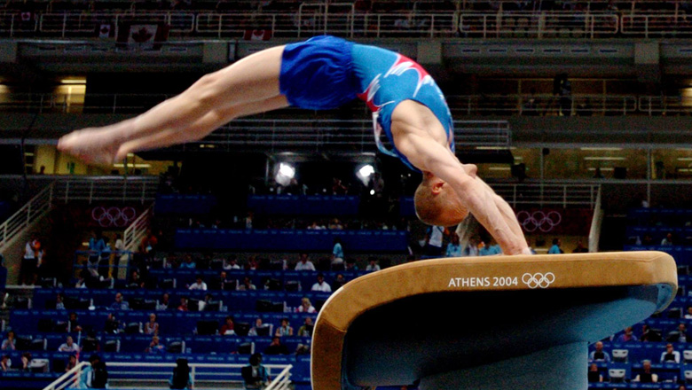 Kyle Shewfelt on vault at Athens 2004