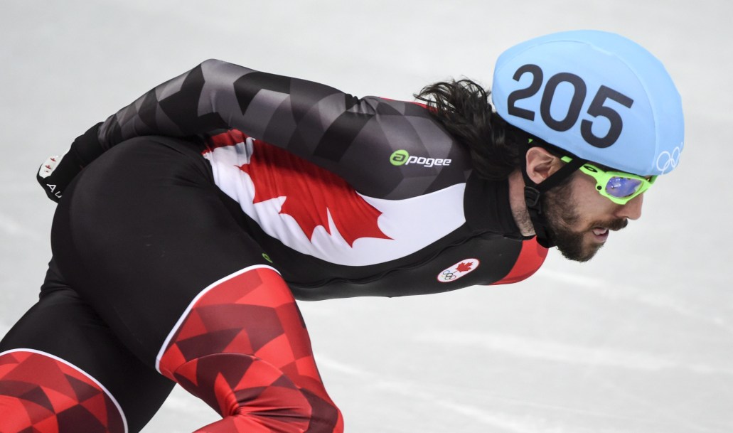 Charles Hamelin rounds a corner in the men's 1000 metre speedskating