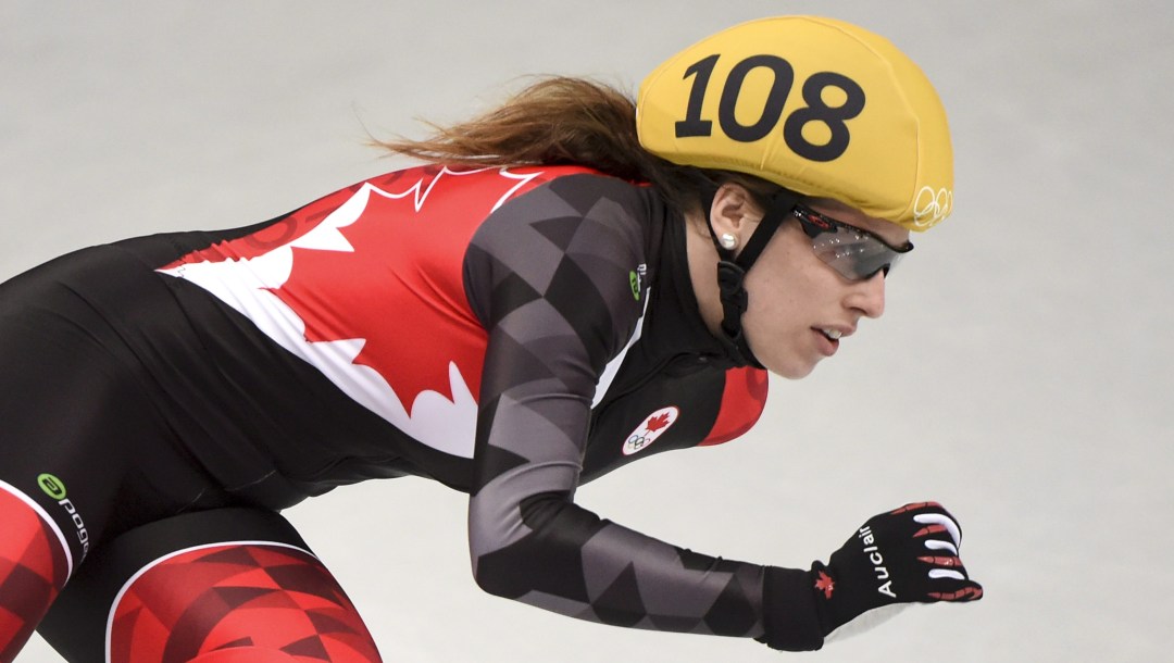 Team Canada - Marianne St-Gelais rounds a corner at the Sochi Winter Olympics