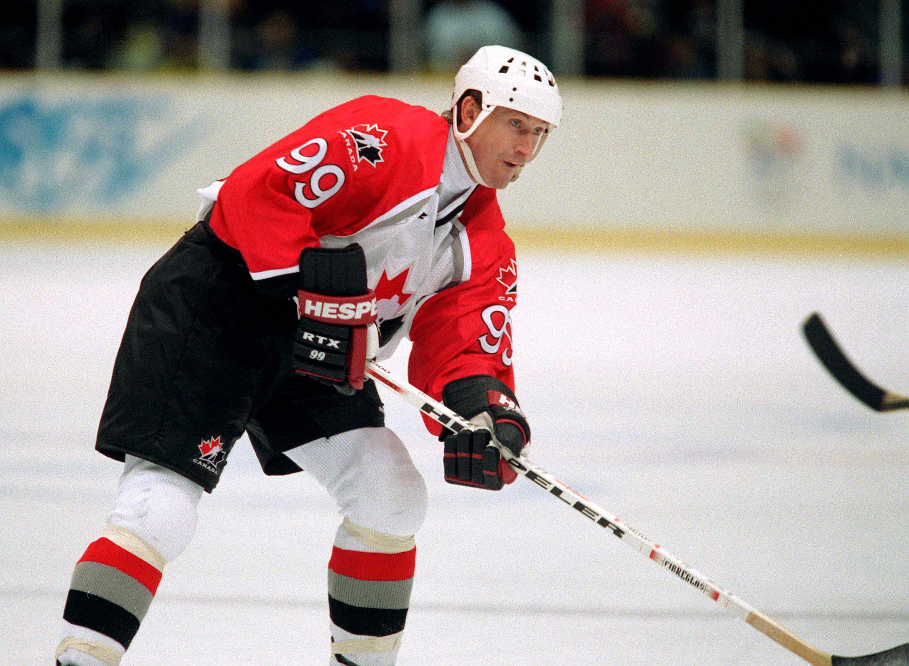 Canada's Wayne Gretzky participates in hockey action against the United States at the 1998 Olympic Winter Games in Nagano. (CP Photo/COC/ F. Scott Grant )