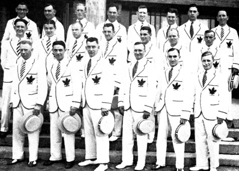 Canadian team in white suits with maple leaf on chest