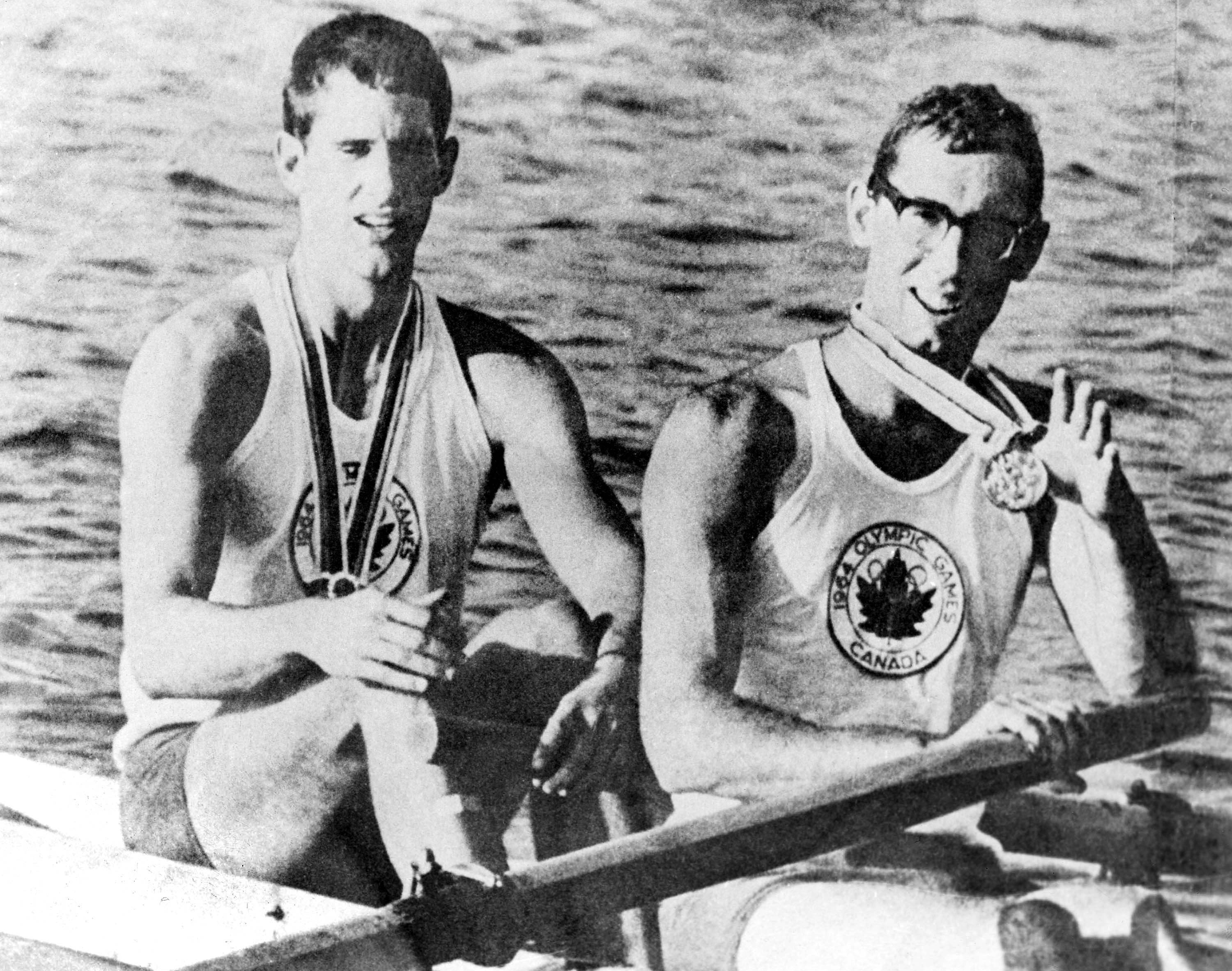 Canada's Roger Jackson and George Hungerford celebrate their gold medal win in the pairs rowing event at the Tokyo 1964 Olympic Games. (CP Photo/COC)