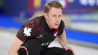 Marc Kennedy competes in curling.
