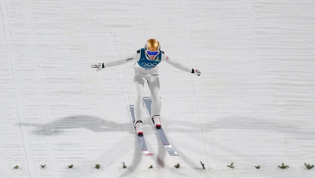 Mackenzie Boyd-Clowes lands a ski jump.