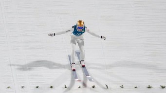 Mackenzie Boyd-Clowes lands a ski jump.