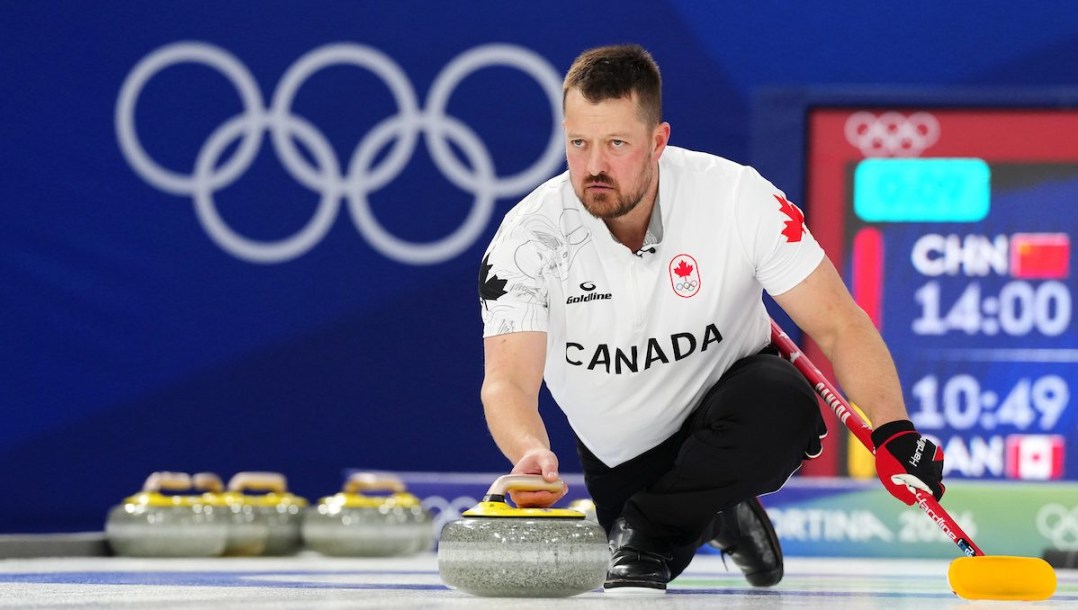 Ben Hebert throws a rock.