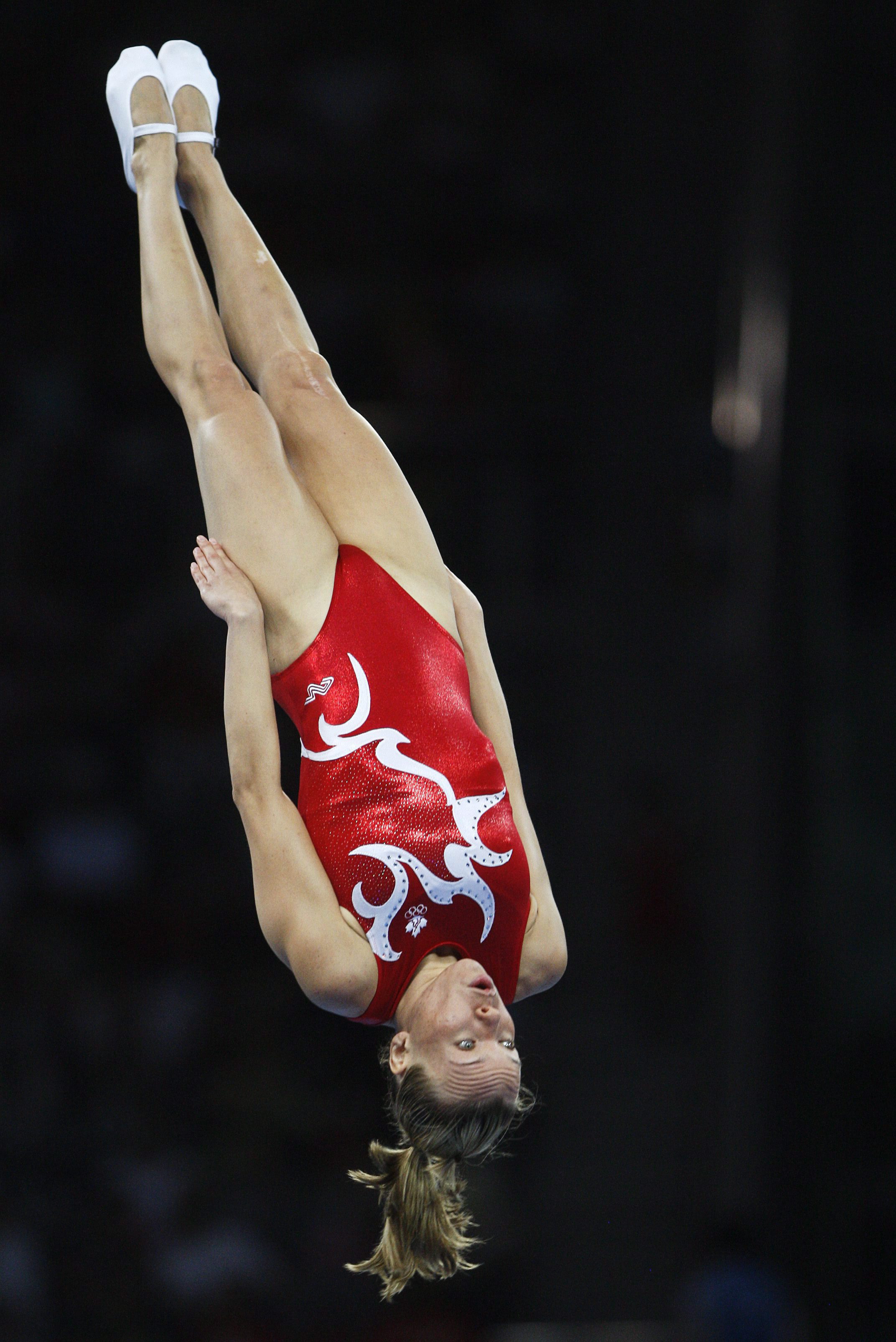 Canada's Karen Cockburn from Toronto performs in the qualifying round of the women's trampoline at the Beijing 2008 Summer Olympics in Beijing, Saturday, August 16, 2008. Cockburn placed fourth. THE CANADIAN PRESS/Paul Chiasson