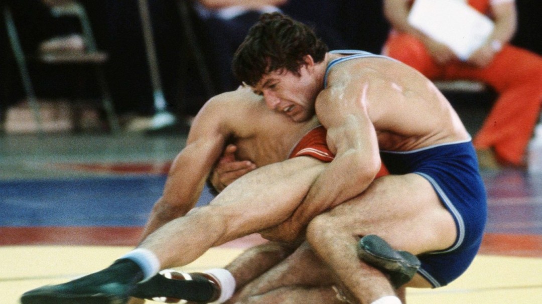 Egon Beiler (blue) competes in the wrestling event at the 1979 Pan American Games