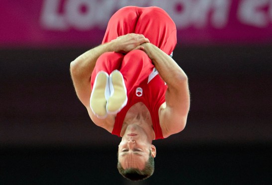 Canada's Jason Burnett performs in the men's trampoline final at London 2012. THE CANADIAN PRESS/Ryan Remiorz