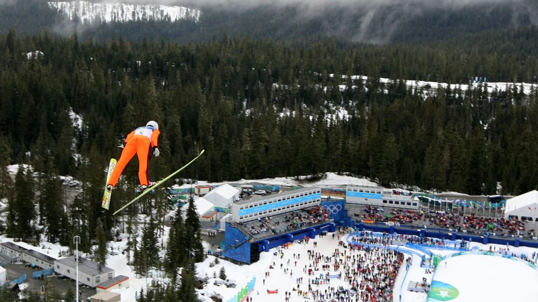 Wide shot of Jason Myslicki ski jumping