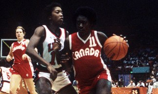 Sylvia Sweeney, right, playing for Canada at Los Angeles 1984