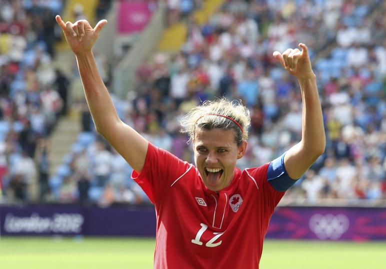 Christine Sinclair celebrates at the Olympics