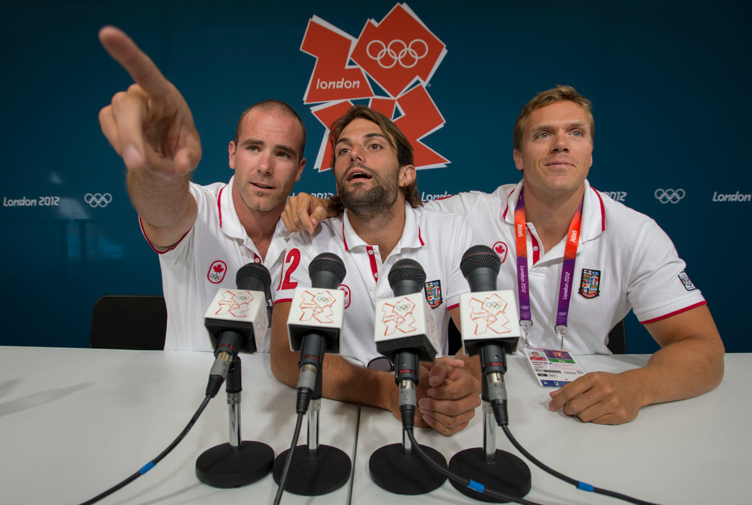 Canadian Olympic team flatwater kayakers, Ryan Cochrane, left, Hugues Fournel, middle and Mark de Jonge ham it up for a photo following a press conference at the Eton Dorney Olympic venue August 3, 2012. Canoe and kayak events start August 6th at the 2012 London Olympics. THE CANADIAN PRESS/HO, COC - Jason Ransom