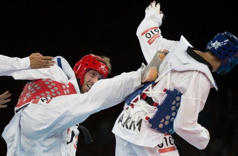Canada's Sebastien Michaud takes on Arman Yeremyan of Armenia in taekwondo at the 2012 London Olympics, August 9, 2012. Michaud lost the match. THE CANADIAN PRESS/HO, COC - Jason Ransom