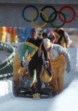 The Jamaican bobsleigh team leaves the track after their final run at Calgary 1988.