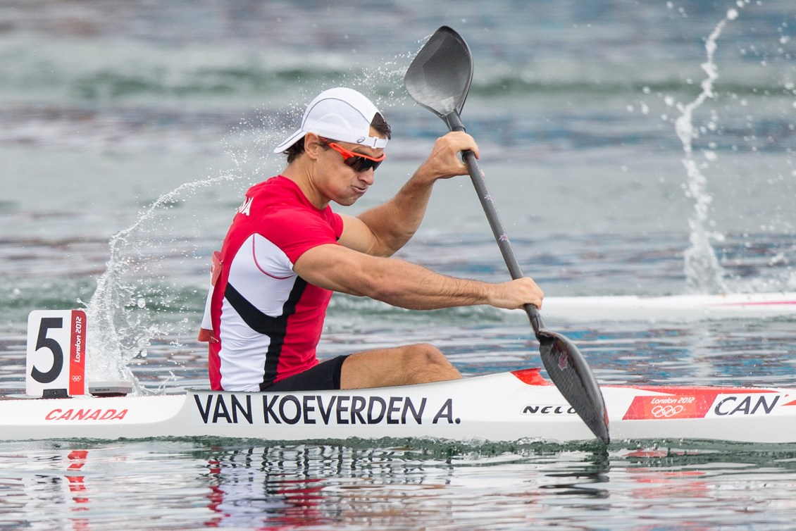 Adam van Koeverden paddling in his kayak 
