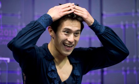 Patrick Chan reacts to seeing his record-breaking score of 98.37