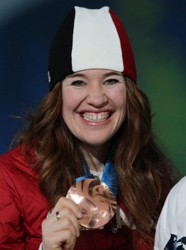 Women's 5000 metre long track speedskating bronze medalist Clara Hughes, of Canada, holds her medal during the medals ceremony at the 2010 Olympic Winter Games in Vancouver, B.C., on Wednesday February 24, 2010. THE CANADIAN PRESS/Darryl Dyck