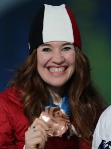 The Canadian Press Women's 5000 metre long track speedskating bronze medalist Clara Hughes, of Canada, holds her medal during the medals ceremony at the 2010 Olympic Winter Games in Vancouver, B.C., on Wednesday February 24, 2010. THE CANADIAN PRESS/Darryl Dyck