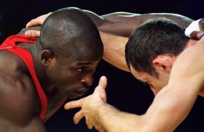 Daniel Igali, of Surry, B.C., wrestles Emzar Bedineishvili