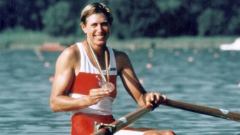 Laumann posing with her medal
