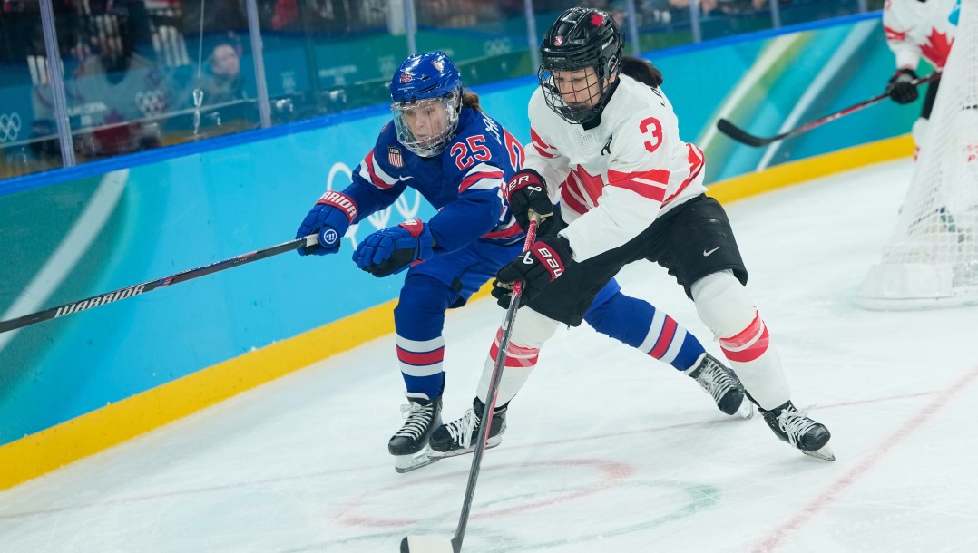 Jocelyne Larocque competes in ice hockey.