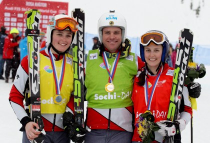 Serwa, right, celebrates her World Cup gold with Thompson, left, and their teammate Chris Del Bosco (Photo: CP)