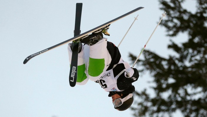 Simon Pouliot-Cavanagh, of Canada, competes during the men's freestyle World Cup moguls event Saturday, Jan. 11, 2014, in Park City, Utah. (AP Photo/Rick Bowmer)