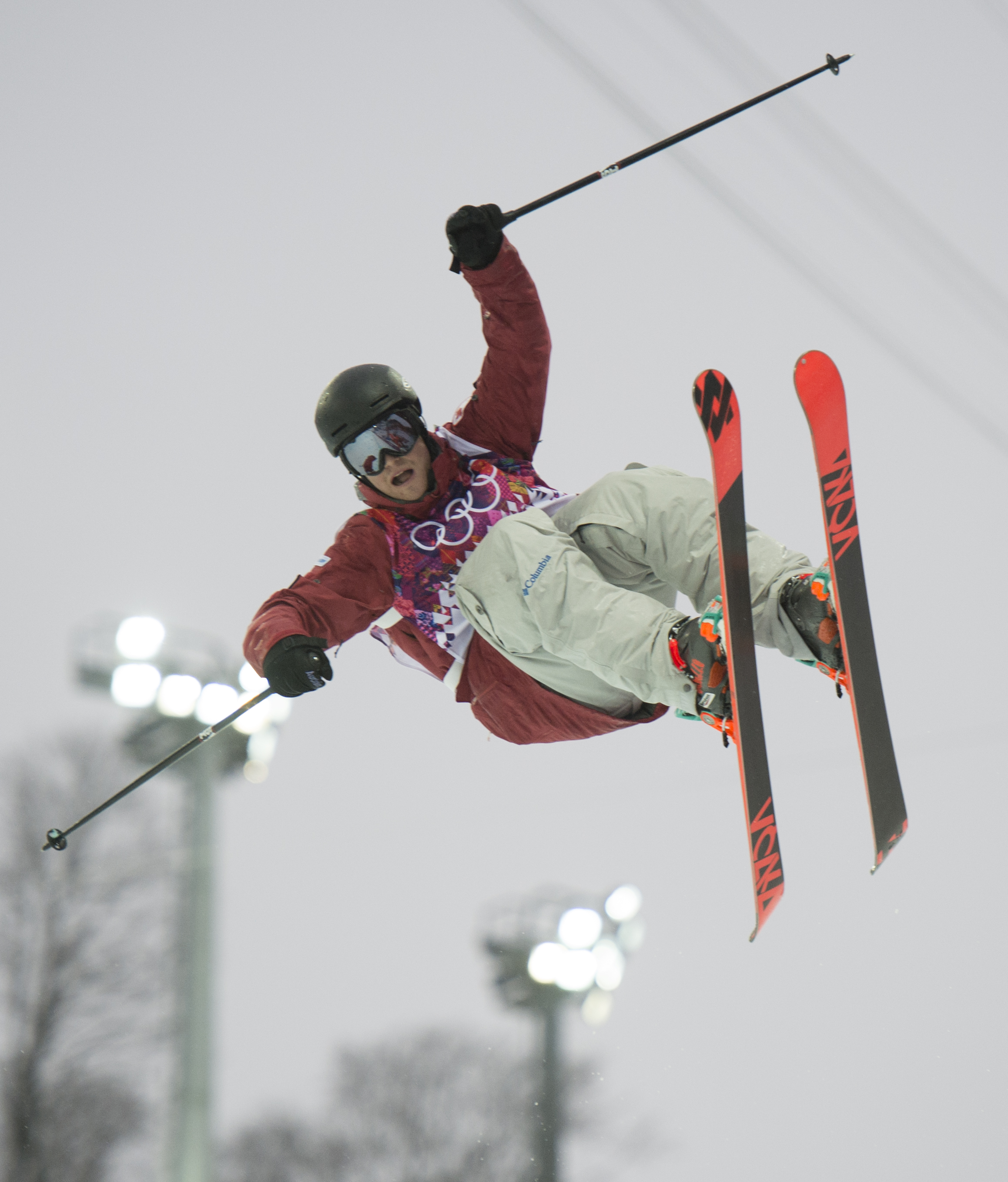 An athlete competing in ski halfpipe