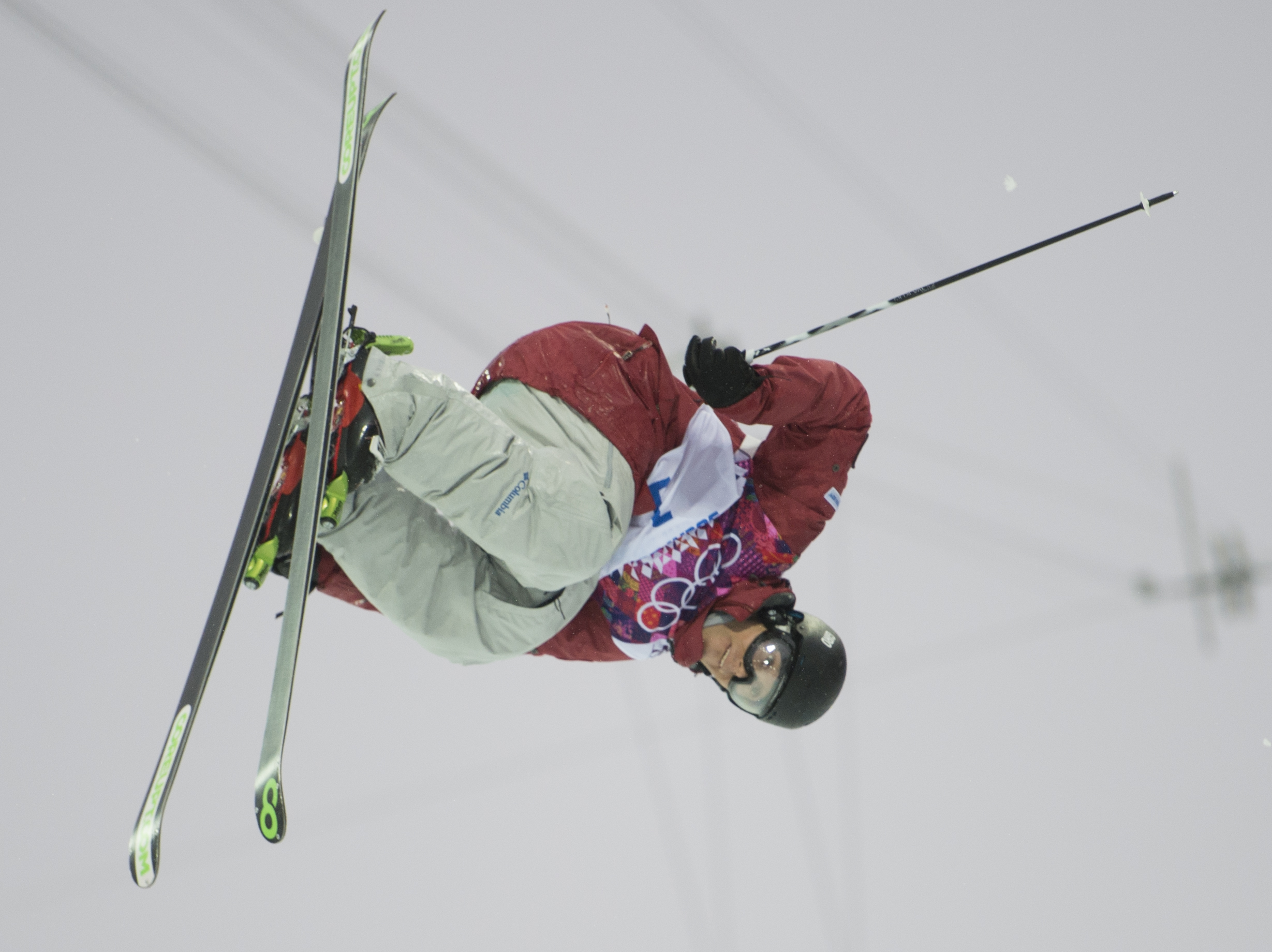 An athlete competing in ski halfpipe