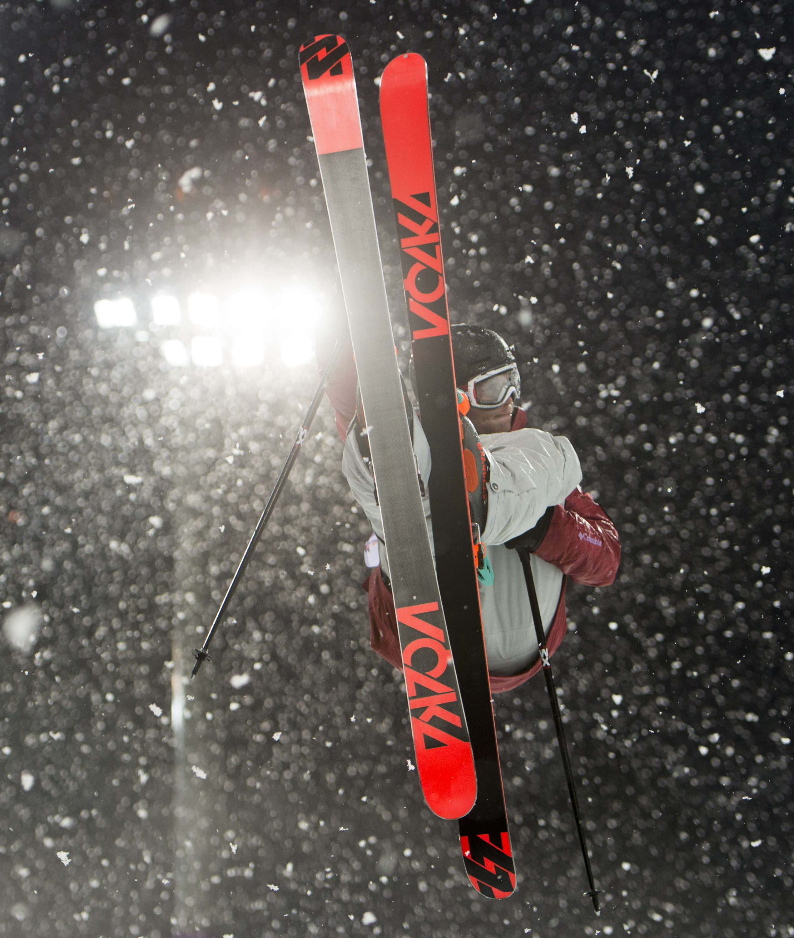 An athlete competing in ski halfpipe