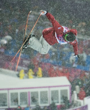 An athlete competing in ski halfpipe
