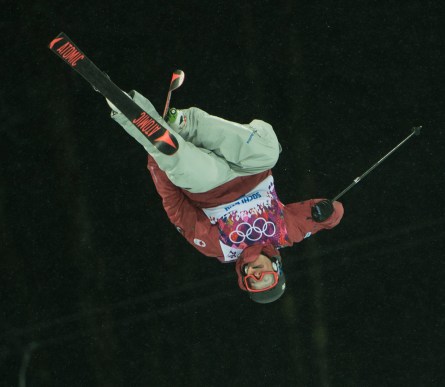 An athlete competing in ski halfpipe