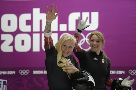 Kaillie Humphries and Heather Moyse waving