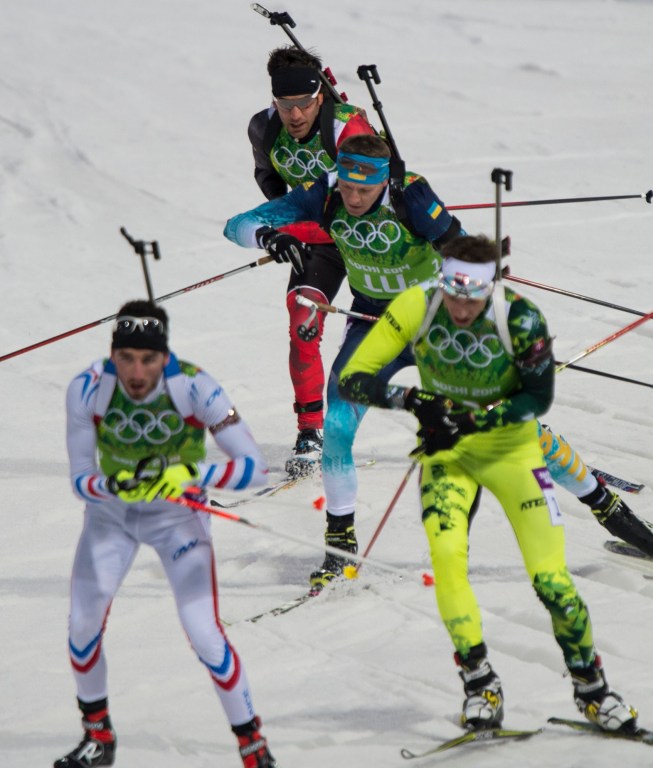 Athletes skiing