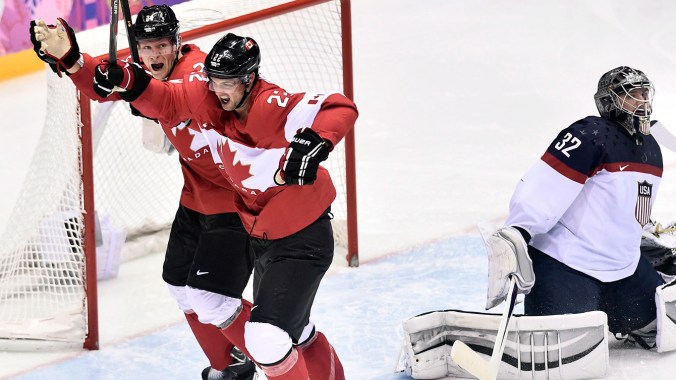 Jamie Benn Canada's Jamie Benn (22) celebrates with Jeff Carter, left ,after scoring the first goal against United States' goaltender Jonathan Quick during second period hockey semi-final action at the 2014 Sochi Winter Olympics in Sochi, Russia on Friday, February 21, 2014. THE CANADIAN PRESS/Nathan Denette