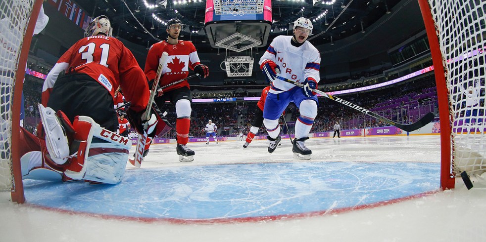 Norway forward Per-Age Skroder (19) reacts as the puck crosses the goal line against Canada in the third period of a men's ice hockey game against Canada at the 2014 Winter Olympics,Thursday, Feb. 13, 2014, in Sochi, Russia. Canada won 3-1. (AP Photo/Julio Cortez, Pool)