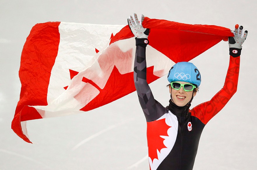 Charle Cournoyer of Canada celebrates his third place finish