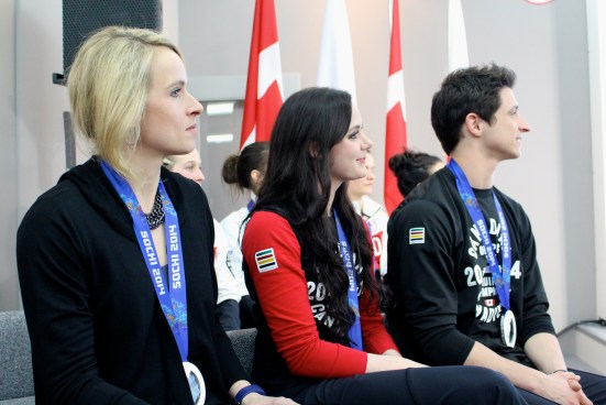 Dominique Maltais, Tessa Virtue and Scott Moir during the medal celebration