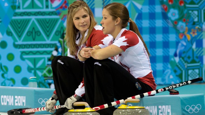 Jennifer Jones and Kaitlyn Lawes sit while discussing strategy