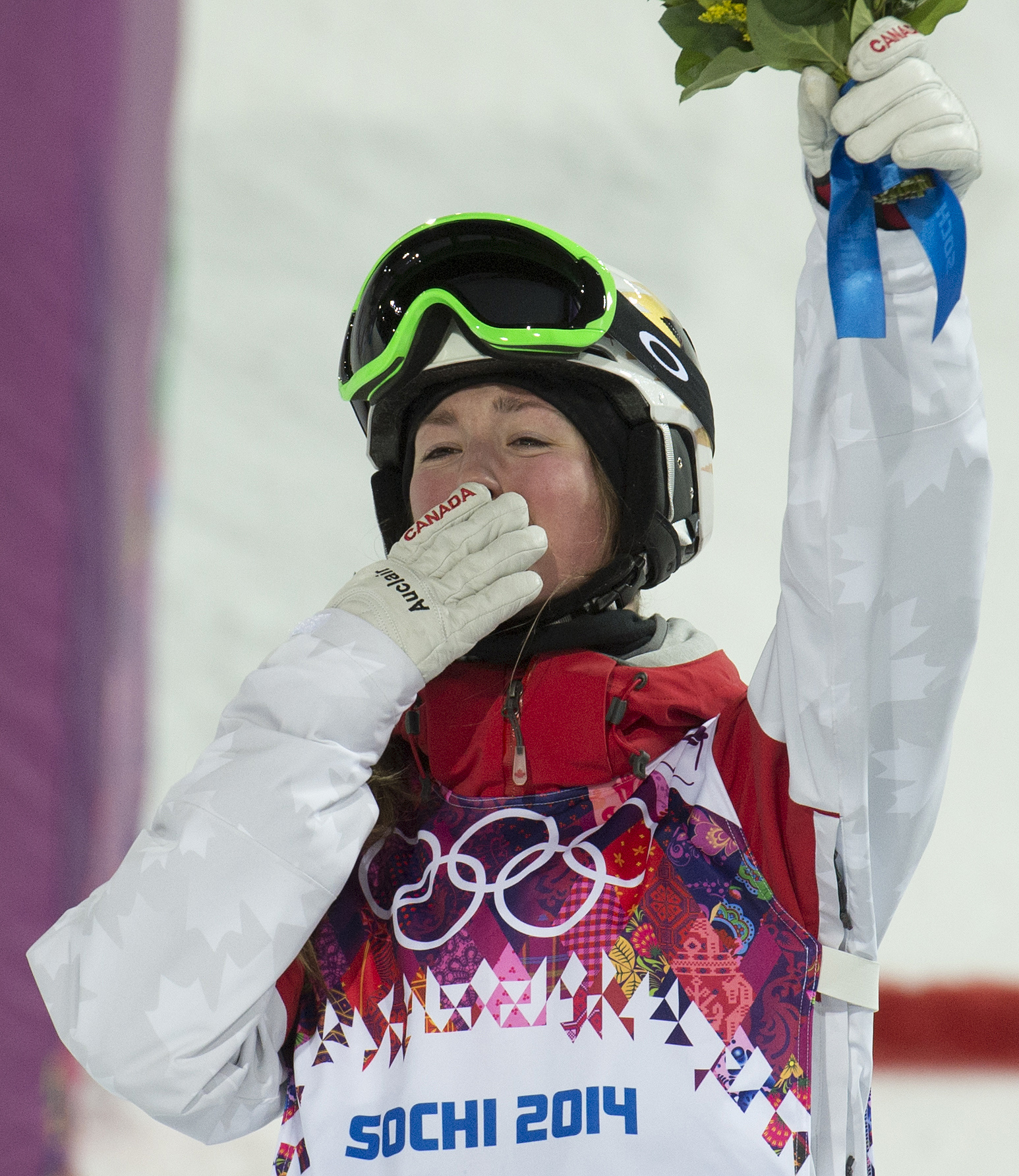 Chloe is on the podium to receive her silver medal.