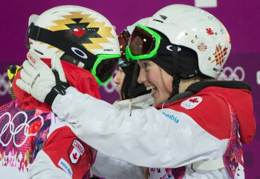 The Dufour-Lapointe sisters celebrate their medal victories.