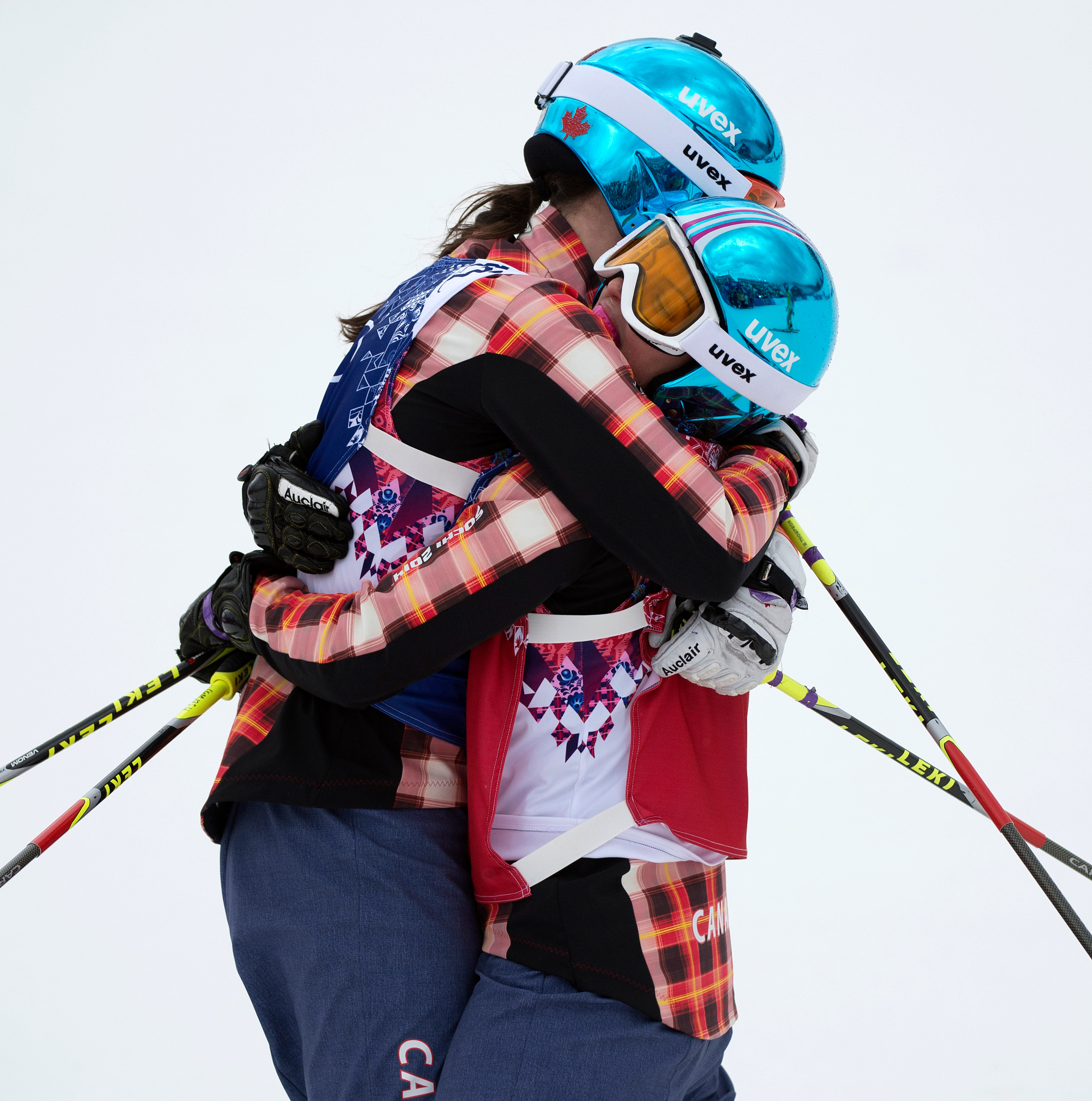 Marielle Thompson and Kelsey Serwa hugging