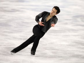 Patrick Chan of Canada competes in the men's short program figure skating competition at the Iceberg Skating Palace during the 2014 Winter Olympics, Thursday, Feb. 13, 2014, in Sochi, Russia. (AP Photo/Darron Cummings)