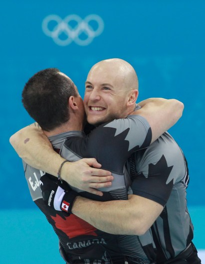 Two Team Canada teammates hugging