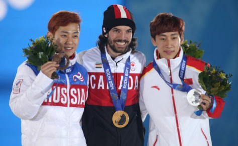 Men's 1500m Short Track Speed Skating Charles Hamelin receives his gold medal in men's 1500 metre short track